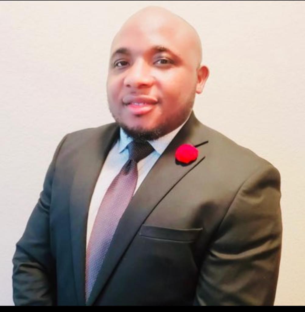 Ernest Asani image showing group president